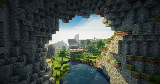 Viste desde dentro de una caverna mirando hacia un bosque, dentro del juego Minecraft